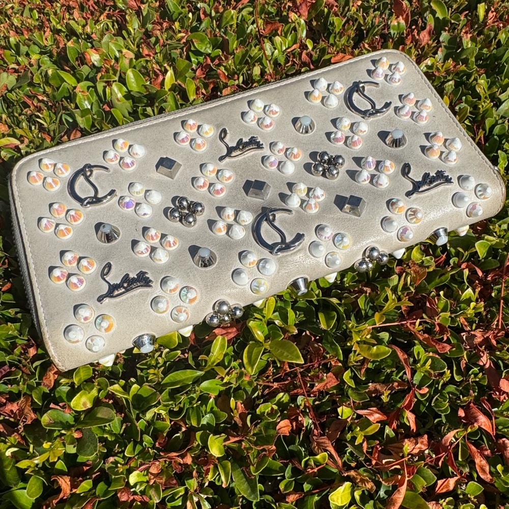 Christian Louboutin Greyish White Embellished Zippy Wallet with Logo